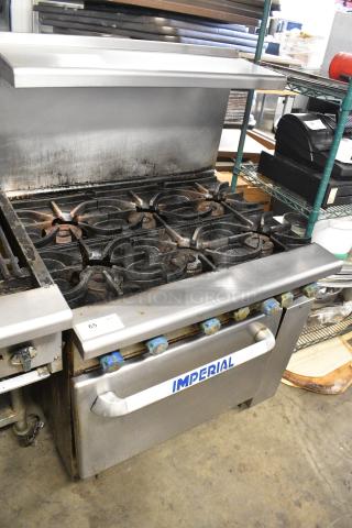 Imperial Stainless Steel Commercial Gas Powered 6 Burner Range w/ Oven, Over Shelf and Back Splash on Commercial Casters.