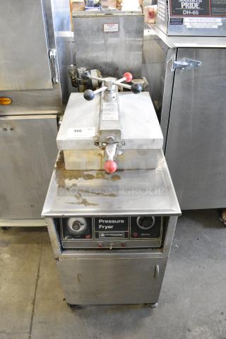 Henny Penny 500 Stainless Steel Commercial Floor Style Electric Powered Pressure Fryer on Commercial Casters. 208 Volts, 3 Phase.