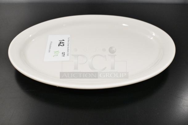 12 BRAND NEW SCRATCH AND DENT! International Tableware VA-14 Valencia 13 1/4" x 10 3/8" Ivory (American White) Narrow Rim Stoneware Platter. 12 Times Your Bid! - Image 1 of 5