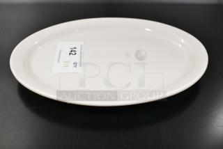 12 BRAND NEW SCRATCH AND DENT! International Tableware VA-14 Valencia 13 1/4" x 10 3/8" Ivory (American White) Narrow Rim Stoneware Platter. 12 Times Your Bid!