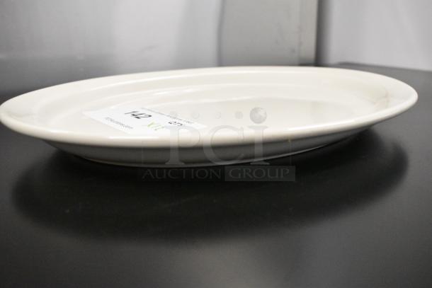 12 BRAND NEW SCRATCH AND DENT! International Tableware VA-14 Valencia 13 1/4" x 10 3/8" Ivory (American White) Narrow Rim Stoneware Platter. 12 Times Your Bid! - Image 3 of 5