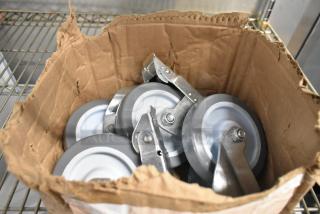 BRAND NEW SCRATCH AND DENT! Box of 4 Commercial Casters