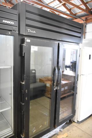 2020 True STG2RPTVLD-2G-2S-HC Metal Commercial 2 Door Reach In Cooler Merchandiser w/ Poly Coated Racks. 115 Volts, 1 Phase.