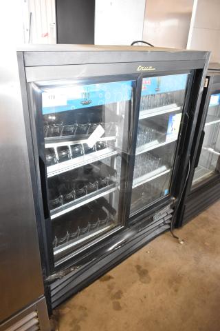 2016 True GDM-41SL-54-HC-LD Metal Commercial 2 Door Reach In Cooler Merchandiser w/ Poly Coated Racks. 115 Volts, 1 Phase.