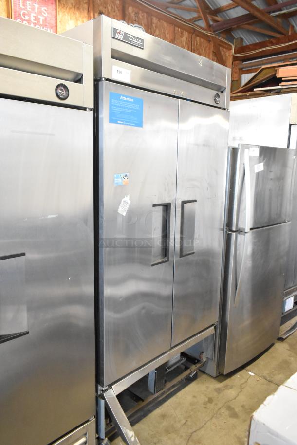 2017 True T-35 Stainless Steel Commercial 2 Door Reach In Cooler w/ Poly Coated Racks on Commercial Casters. 115 Volts, 1 Phase. Cannot Test Due To Cut Power Cord - Image 1 of 8