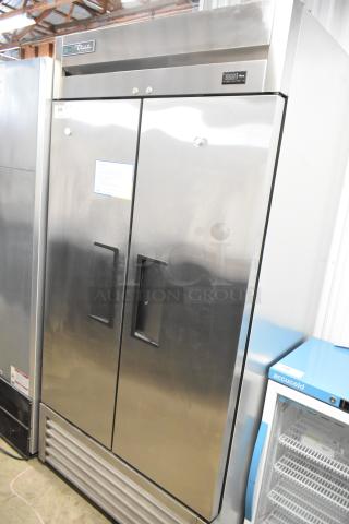 True Stainless Steel Commercial 2 Door Reach In Freezer w/ Poly Coated Racks. 115 Volts, 1 Phase.