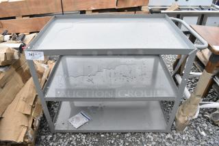 BRAND NEW SCRATCH AND DENT! Lavex Gray Metal 3 Tier Cart w/ Commercial Casters.