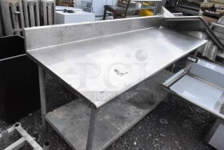 Stainless Steel Table w/ Back Splash and Under Shelf.