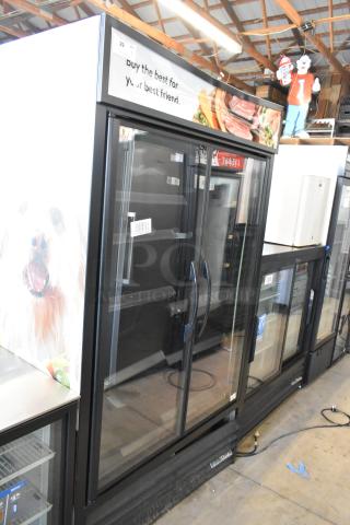2022 True TVM-48SL-HC Metal Commercial 2 Door Reach In Cooler Merchandiser w/ Metal Racks. 115 Volts, 1 Phase.