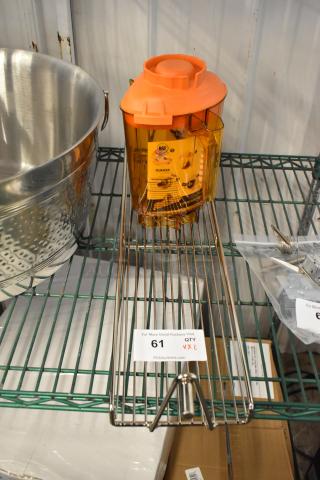 2 BRAND NEW SCRATCH AND DENT! Items Including Metal Rotisserie Spit and Orange Poly Blender Pitcher. 2 Times Your Bid!