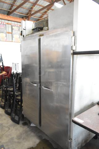 Traulsen G22010 Stainless Steel Commercial 2 Door Reach In Cooler on Commercial Casters. 115 Volts, 1 Phase.
