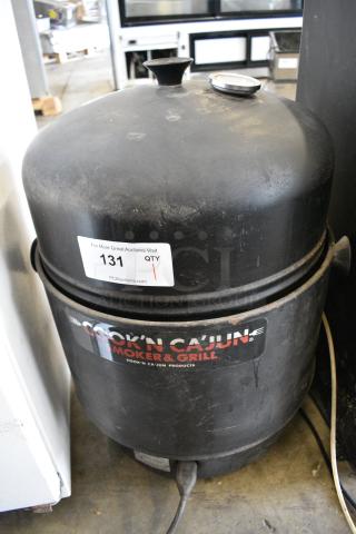 Cook'n Ca'jun ES-90 Metal Smoker & Grill.