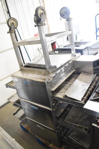 3 2017 Turbochef HhC2020 Stainless Steel Commercial Electric Powered Rapid Cook Conveyor Oven w/ Stand on Commercial Casters. 208/240 Volts, 3 Phase. 3 Times Your Bid!