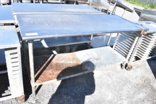 Stainless Steel Table w/ Metal Under Shelf and Commercial Can Opener Mount on Commercial Casters.