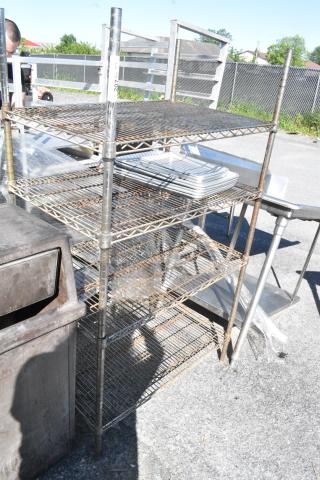 Chrome Finish 4 Tier Wire Shelving Unit. BUYER MUST DISMANTLE. PCI CANNOT DISMANTLE FOR SHIPPING. PLEASE CONSIDER FREIGHT CHARGES.