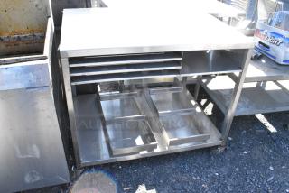 Stainless Steel Commercial Table w/ Under Shelf on Commercial Casters.
