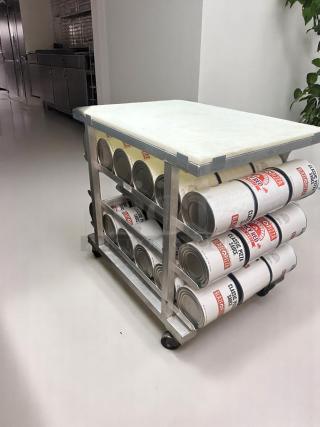 Excellent Condition Mobile Prep Table with White Cutting Board & Built-In Can Rack Storage – 35" x 26"
