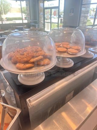 Excellent Condition Cake Display Stands with Dome Covers – White Ceramic Base – Fully Inspected & Presentable!