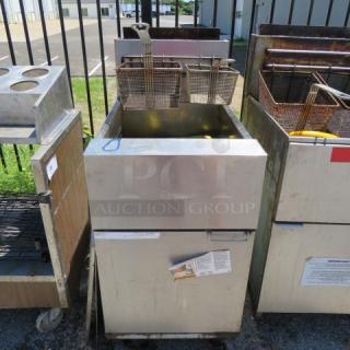 One Dean Natural Gas Deep Fryer With 2 Baskets On Casters. Model# SR1620GN. 20X32.5X45. $2146.00
