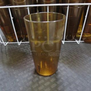 One Lot Of Amber Poly Tumblers.