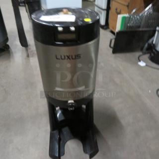 One Fetco Luxus 1.5 Gallon Server On Stand.  #99026
