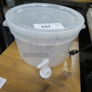 One Carlisle Beverage Dispenser. With Lid.