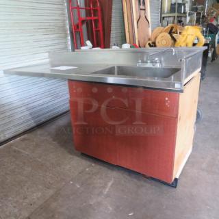 One Wooden 2 Door Cabinet With A Stainless Steel Sink With Faucet And  R Side Drain Board. 85X32X46