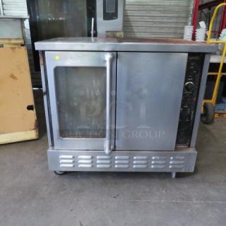 One Majestic American Range Convection Oven With 2 Racks On Casters. 40X33X39