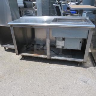 One Stainless Steel Table With A Delfield Manitowic Drop In Cold Well. Model# N8118B. 60X24X37. $4347.00