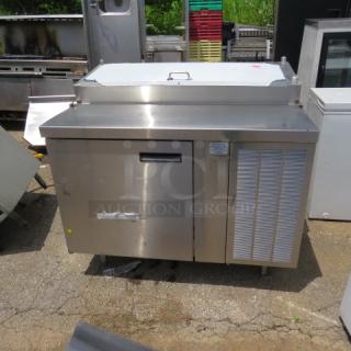 One Delfield 1 Door Refrigerated prep Table With 2 Racks. Model# F18RC47. 115 Volt. 47X34X44