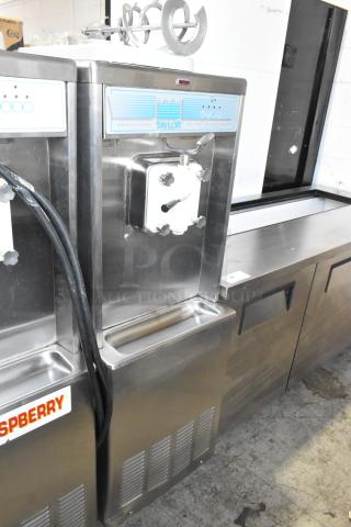 Taylor 441-33 Stainless Steel Commercial Water Cooled Floor Style Single Flavor Soft Serve Ice Cream Machine on Commercial Casters. 208-230 Volts, 3 Phase. - Item #1188016