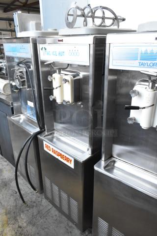 Taylor 441-33 Stainless Steel Commercial Water Cooled Floor Style Single Flavor Soft Serve Ice Cream Machine on Commercial Casters. 208-230 Volts, 3 Phase. - Item #1188017