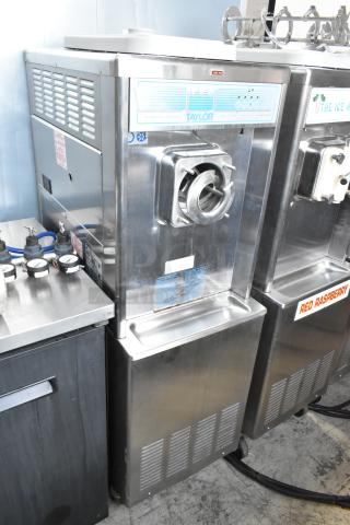 Taylor 441-27 Stainless Steel Commercial Water Cooled Floor Style Single Flavor Soft Serve Ice Cream Machine on Commercial Casters. Missing Front Piece. 208-230 Volts, 1 Phase. - Item #1188018