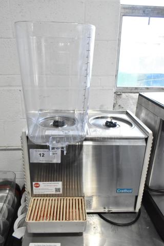 2022 Crathco D25-4 Stainless Steel Commercial Countertop 2 Hopper Refrigerated Beverage Machine. Missing Drip Tray, 1 Hopper and 2 Lids. 115 Volts, 1 Phase.