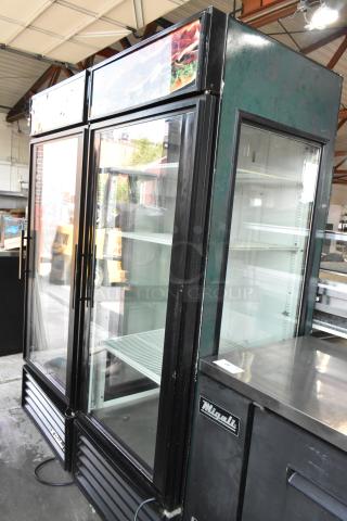 True GEM-26 Metal Commercial Single Door Reach In Cooler Merchandiser w/ Poly Coated Racks. 115 Volts, 1 Phase.