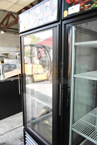 True GEM-26 Metal Commercial Single Door Reach In Cooler Merchandiser w/ Poly Coated Racks. 115 Volts, 1 Phase.