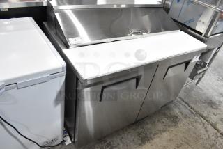 BRAND NEW SCRATCH AND DENT! 2025 True TSSU-48-12-HC Stainless Steel Commercial Sandwich Salad Prep Table. 115 Volts, 1 Phase.