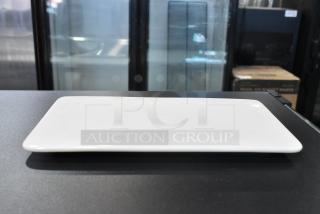 4 BRAND NEW SCRATCH AND DENT! Boxes of 3 Acopa White Ceramic Rectangular Plates. 4 Times Your Bid!
