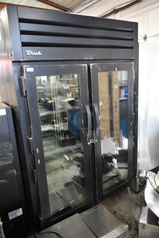 2020 True STG2RPTVLD-2G-2S-HC Metal Commercial 2 Door Reach In Pass Through Cooler Merchandiser. 115 Volts, 1 Phase.