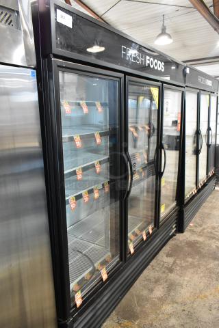 2017 True GDM-72-HC Metal Commercial 3 Door Reach In Cooler Merchandiser w/ Poly Coated Racks. 115 Volts, 1 Phase.