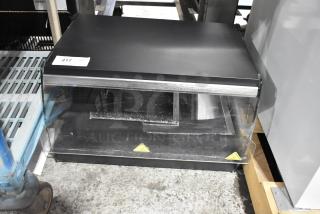 BRAND NEW SCRATCH AND DENT! Avantco 177OAM1A 26" Black Countertop Merchandiser with LED Lighting and 1 Shelf. 120 Volts, 1 Phase.