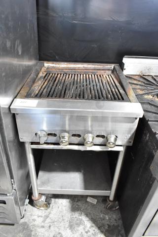 Jade Range Stainless Steel Commercial Natural Gas Powered Charbroiler Grill w/ Under Shelf on Commercial Casters.
