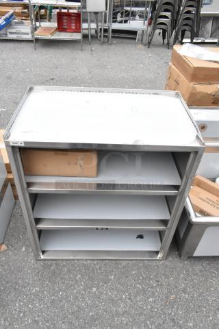 BRAND NEW SCRATCH AND DENT! Regency 600CT4S1830E 18" x 30" Four Shelf 18-Gauge 304 Stainless Steel Utility Cart with Enclosed Base and Open Front