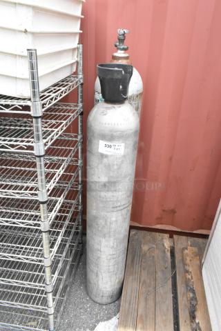 2 Metal Tanks. 2 Times Your Bid! Buyer Must Pick Up - We Will Not Ship This Item.