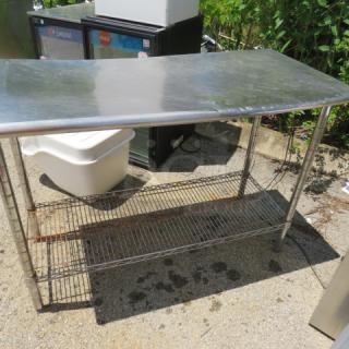 One Stainless Steel Table With A Metro Under Shelf. 49X24X36