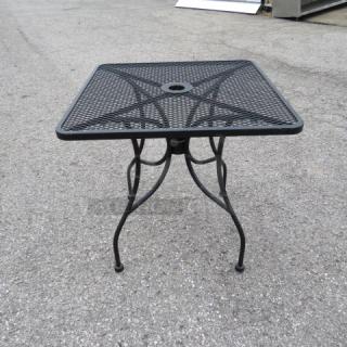 One Black Metal Patio Table With Umbrella Hold.  30X30X30