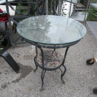 One Black Metal Table With A Glass Top. 24X29