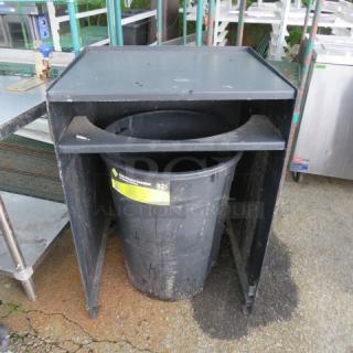 One Black Metal Trash Receptacle With Trash Can. 27X24X39
