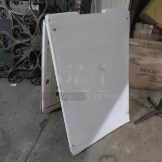 One Sidewalk Sign.