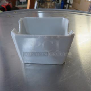One Lot Of 38 Sugar Pack Holders.